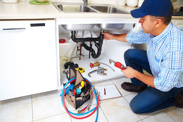 A plumber doing his works
