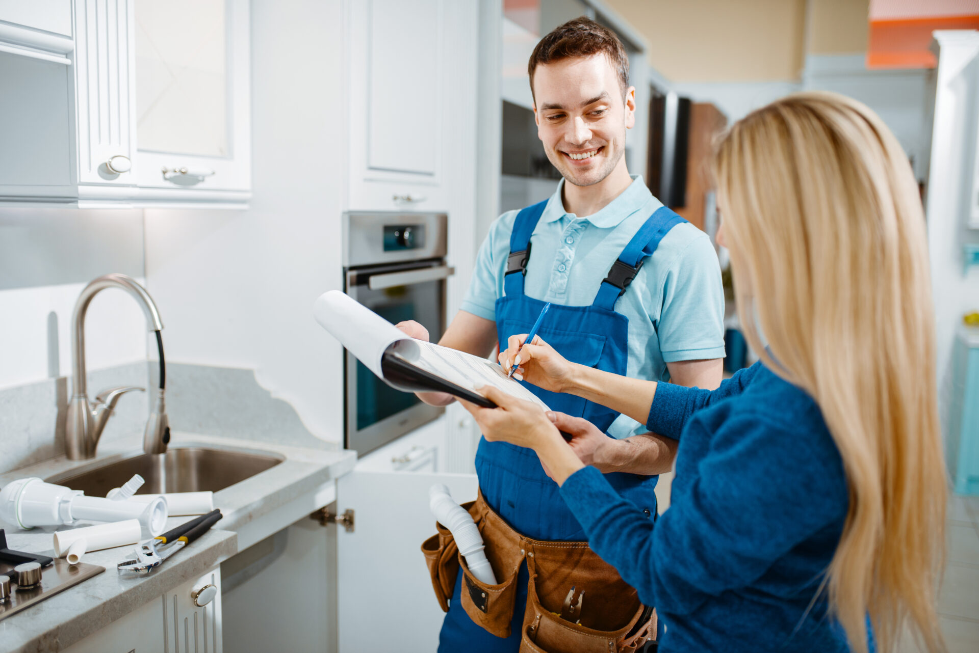 plumber guiding female client