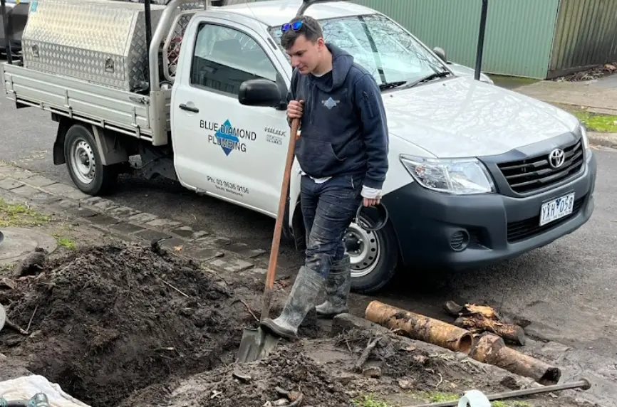 A Blue Diamond plumber carrying out underground drainage and pipe replacement work in Melbourne.